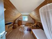 Zimmer im Dachgeschoss - 