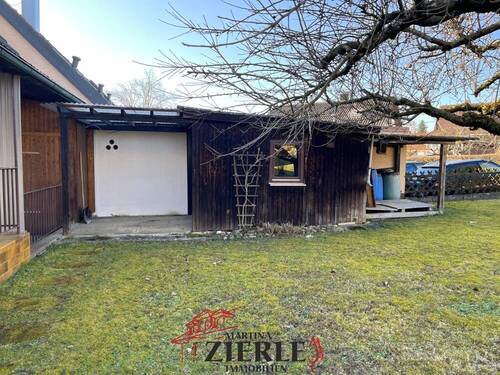 15- Gartenhütte mit überdachtem Außensitz - 