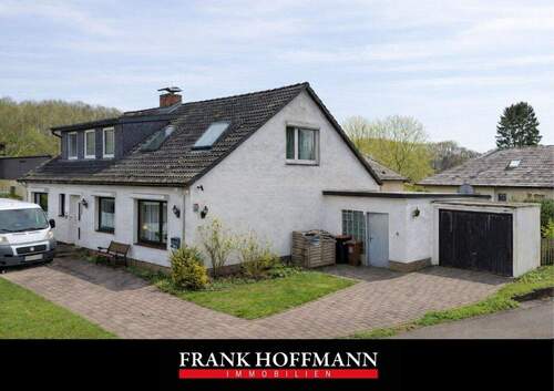 V10105 Titelbild - Sanierungsbedürftiges Zweifamilienhaus auf großzügigem Grundstück in Sievershütten