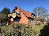 Vorgarten - Einfamilienhaus mit 161,00 m&sup2; in Stuhr zum Kaufen