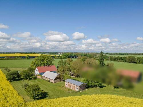 Luftaufnhame - 7 Zimmer Einfamilienhaus zum Kaufen in Lindendorf-Dolgelin