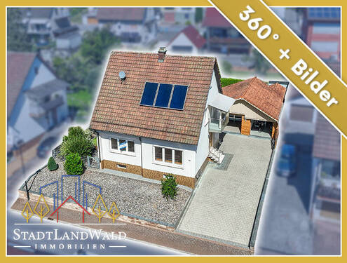 Titelbild - Sofort bezugsbereit! Attraktives EFH mit 2 Wohneinheiten, Garten, Terrasse und Garagen