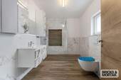 Badezimmer Erdgeschoss - Einfamilienhaus mit 185,20 m² in Blindheim / Unterglauheim zum Kaufen