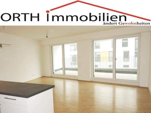 Wohn - Esszimmer mit Terrrasse - Attraktive 4 Zi. Neubauwohnung mit EBK und Fußbodenheizung plus Sonnenterrasse.