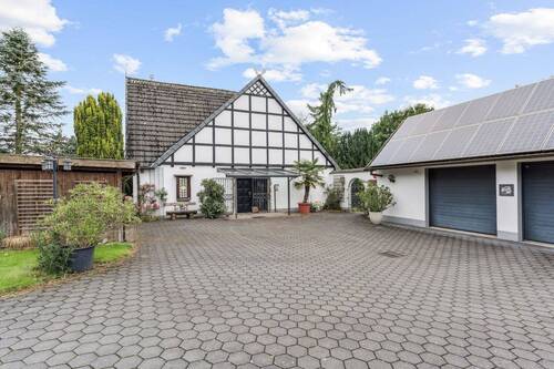 Ansicht 2 - Einfamilienhaus mit 232,00 m² in Bissendorf zum Kaufen