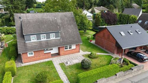 Außenansicht - ***NENNDORF***EINFAMILIENHAUS MIT SEP. WOHNUNG UND GARAGEN ZU VERKAUFEN***