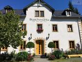 Außenansicht - 2-Raum-Erdgeschosswohnung mit Einbauküche in SchmiedebergBuschmühle!
