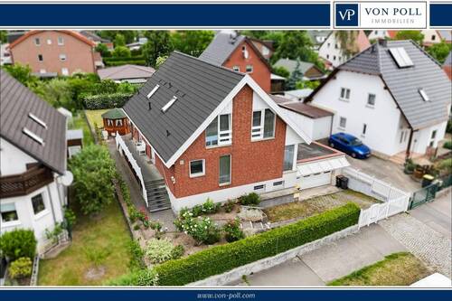 Titel - Großzügiges Einfamilienhaus mit separater Einliegerwohnung und vielen Möglichkeiten