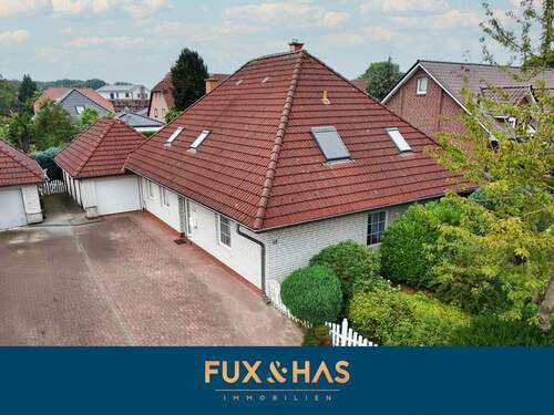 Bild 1 - Ruhige Wohnlage in Werlte - Bungalow mit lichtdurchflutetem Wintergarten!