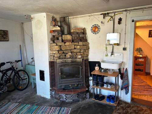 Durchgangszimmer mit Holzofen - 