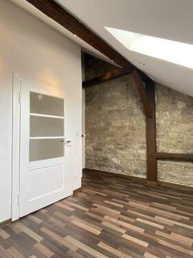 Raum der Dachgeschosswohnung - 
