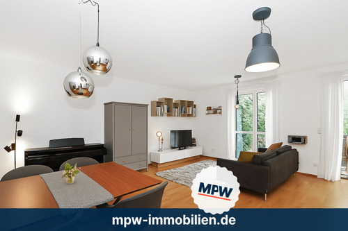 Wohnzimmer - Moderne Gartenwohnung: mit Terrasse und in toller Lage