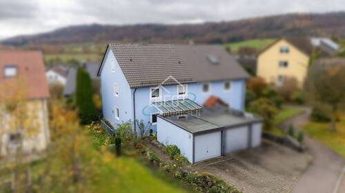 Außenansicht - Gepflegte Doppelhaushälfte mit Garten, Terrasse und Ausbaupotenzial in ruhiger Lage