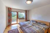 Schlafzimmer mit Balkonzugang - 