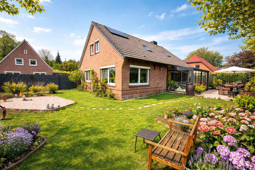 Gartenansicht - Haus mit Einliegerwohnung, EBK, Sommergarten und Garage!