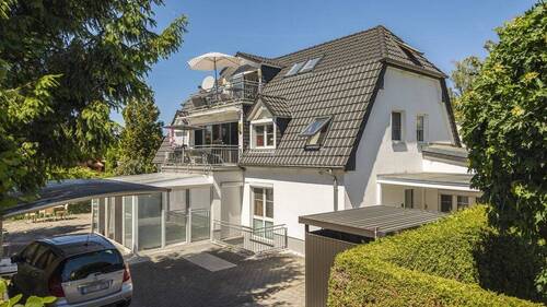 Hausansicht - Mehrgenerationenhaus mit Seltenheitswert: 3 Wohneinheiten, Wintergarten, Sonnenterrassen & Mieteinnahmen!