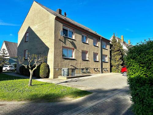 Hinteransicht - Haus 2 - 2 Zimmer Mehrfamilienhaus, Wohnhaus in Schönwölkau