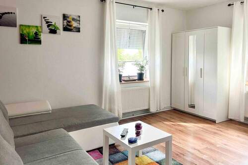 Wohnzimmer - Einfamilienhaus mit 65,00 m² in Hamburg zum Kaufen