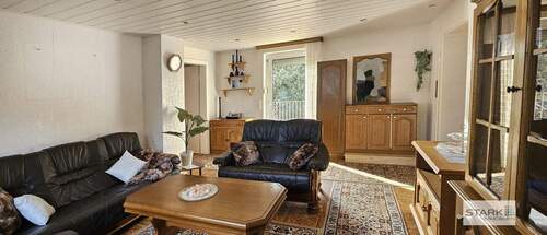 EG Wohnzimmer Ansicht zur Terrasse.jpg - Mehrfamilienhaus, Wohnhaus in Kirchheim zum Kaufen