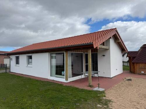 Überdachte Terrasse - 4 Zimmer Mehrfamilienhaus, Wohnhaus zum Kaufen in Butjadingen