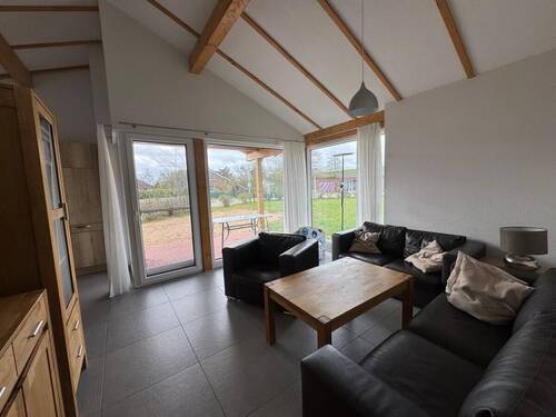 Wohnzimmer - Mehrfamilienhaus, Wohnhaus mit 66,00 m&sup2; in Butjadingen zum Kaufen