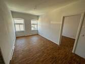 Wohnzimmer - Etagenwohnung mit 75,00 m&sup2; in Kitzingen zur Miete