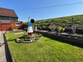 Garten - Einfamilienhaus mit 125,00 m² in Uetersen zum Kaufen