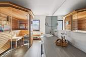 Bad mit Sauna im Obergeschoss - 