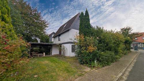Seitliche Ansicht mit Carport - 4 Zimmer Einfamilienhaus zum Kaufen in Maasholm