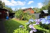 Rückseite Garten - Bungalow mit 136,00 m&sup2; in Henstedt-Ulzburg zum Kaufen