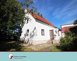 Gute Lage - Schönes Grundstück mit renovierungsbedürftigem Wohnhaus