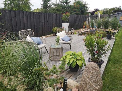 Außenanlage m.Holzterrasse - 