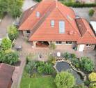 Ansicht Luftbild - 7 Zimmer Einfamilienhaus zum Kaufen in Rhauderfehn