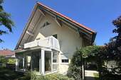 Südansicht mit Wintergarten und Balkon - 5 Zimmer Einfamilienhaus zum Kaufen in Geltendorf