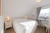 1. Schlafzimmer Wohnung DG - 5 Zimmer Etagenwohnung in Scharbeutz