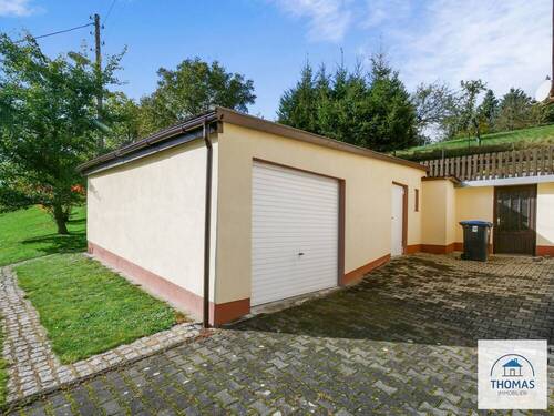 Ansicht Garage Werkstatt - Einfamilienhaus mit 161,00 m&sup2; in Neustadt zum Kaufen