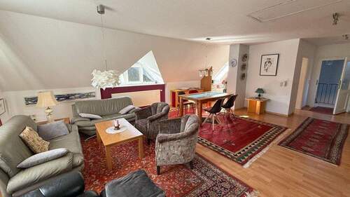 Wohnzimmer im Dachgeschoss der Wohneinheit - 