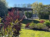 Gartenblick zum Doppelcarport - 
