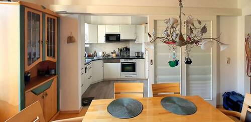 Küche mit Glasschiebetür - 