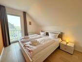 Schlafzimmer mit Balkonzugang - 