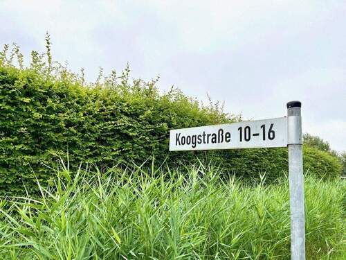 Straßenschild - Grundstück in Tating zum Kaufen