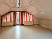 Zimmer im Dachgeschoss - 