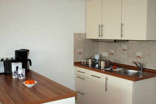 offener Küchenbereich mit EBK - 