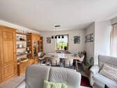 Wohnzimmer im Erdgeschoss Bild 1 - 7 Zimmer Mehrfamilienhaus, Wohnhaus zum Kaufen in Alling