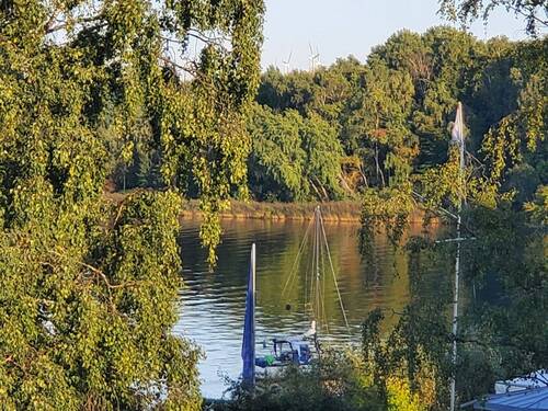Blick von der Terrasse auf die Trave - 3 Zimmer Etagenwohnung zum Kaufen in Lübeck