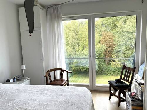 Schlafzimmer mit Blick ins Grüne - 