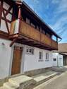 Hauseingang und Hochbalkon - 