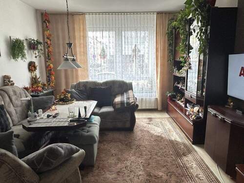 Wohnzimmer EG rechts - Mehrfamilienhaus, Wohnhaus in Düren