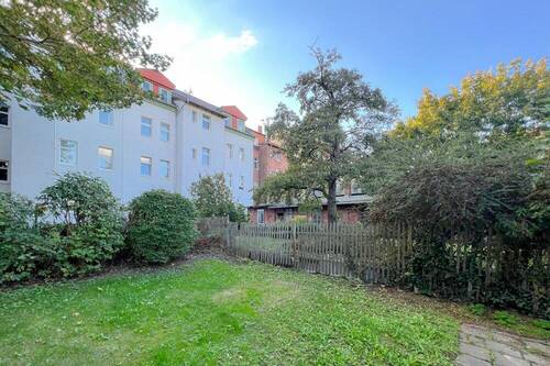 Gemeinschaftsgarten mit Grillplatz - 