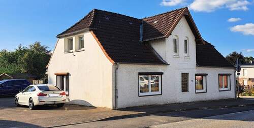 Straßenansicht.jpg - Mehrfamilienhaus, Wohnhaus in Schenefeld